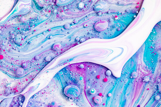 Fluid art texture. Backdrop with abstract iridescent paint effect. Liquid acrylic artwork that flowing bubbles. Mixed paints for website background. Aquamarine, purple and white overflowing colors