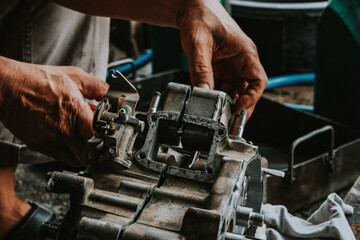 Motorcycle engines awaiting maintenance and engine repair.