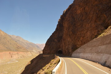 Driving and hiking in the Andes Mountains between Chile and Argentina on the way to Mendoza