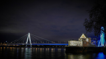 bridge and ferris wheel at night