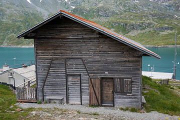 Fototapeta premium Bernina Pass, Switzerland - July 21, 2020 : Wood house at Ospizio Bernina