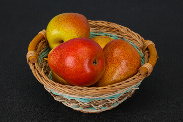 Pear heap in the wooden basket