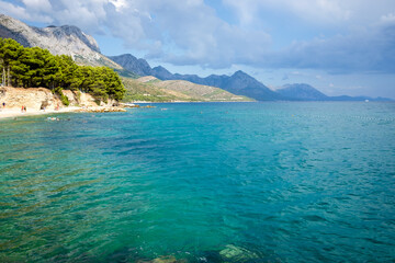 colorful sea view with mountains in background, zivogosce, croatia
