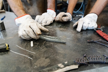 Craftsmen working in garage together