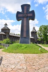 Memorial Cross to Cossack defenders on the territory of old wooden Cossack fortress in Baturin, Ukraine.