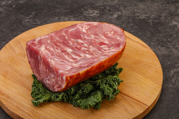 Beef ham piece over board