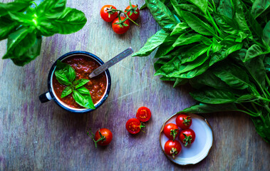 Homemade Pizza Sauce with Green Basil, Tomatoes and Garlic. Top view. Horizontal Orientation