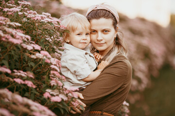 mother holding a baby in her arms