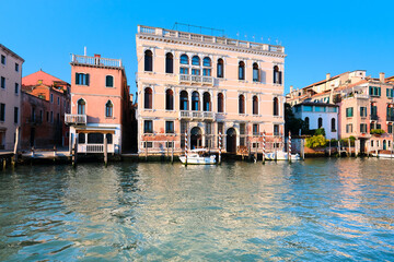 Fototapeta na wymiar Traditional houses, old architecture on Grand Canal in Venice, Italy.