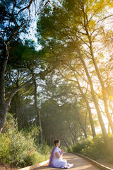 Woman meditating in the pathway