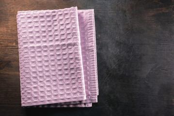 A towel on the old table flat lay background.