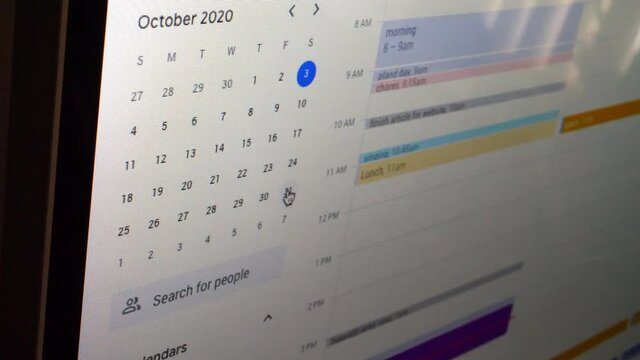 A digital calendar app with events, meetings, and time management on a computer screen.