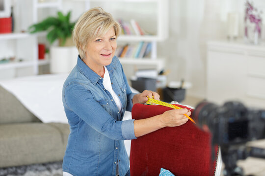 senior woman recording a video blog