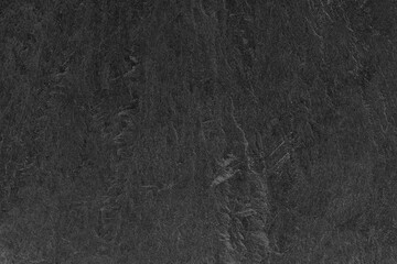 Dark grey black slate background or texture.