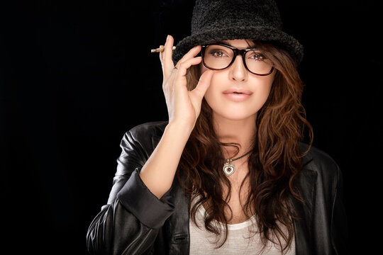 Trendy young woman wearing stylish glasses