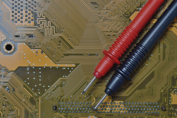 checking the computer motherboard for problems using a multimeter.
