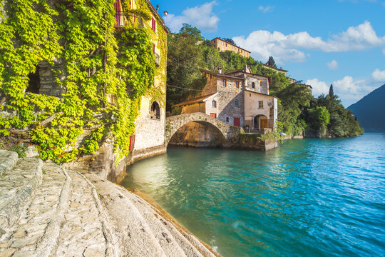 Old stone bridge at the end of Nesso's ravine, Como, Italy
