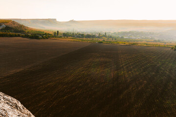 Obraz premium View of a wide valley, summer nature scenery at sunset