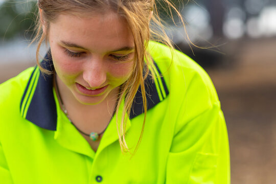 Close up of young woman wearing hi-vis
