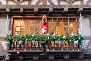 Fototapeta na wymiar Christmas decorations in the Christmas Market, Colmar, Alsace, France
