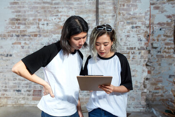 Young event planners working together on set