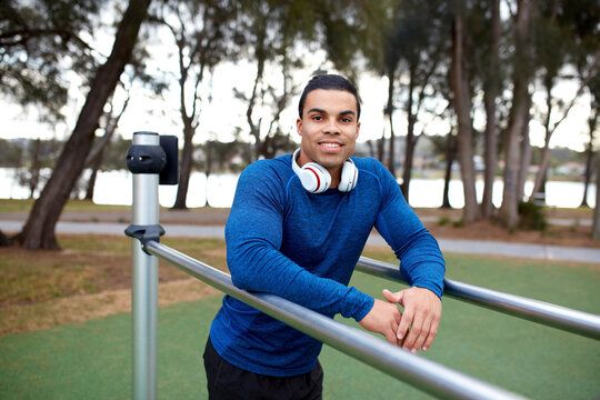 Young Indigenous man working out at park