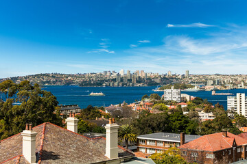View of Sydney harbour over various properties