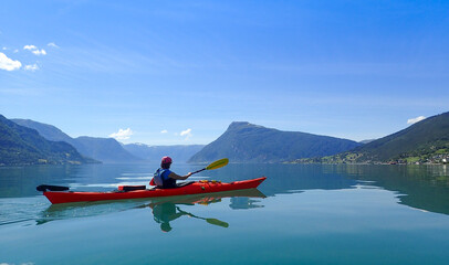 Sea kayaking in Norwegian fjord