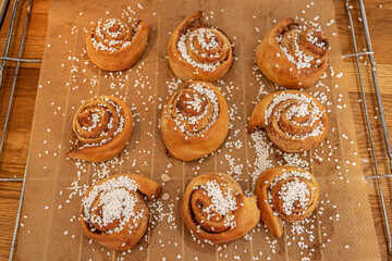Cinnamon buns on a plate after baking