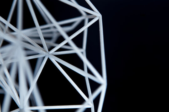 Abstract structure 3D printed. Net structure against black background. Abstrakte Struktur 3D gedruckt.
Netz Struktur vor schwarzem Hintergrund. 