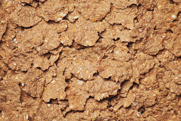 Dietic fitness corn flakes extremely close-up macro texture background