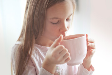 Child drinking cocoa