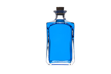 Blue fluid in decorative vintage glass bottle isolated on white background. Bottle with cork.