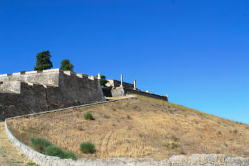 Old defensive fort on a hill, with an observation tower
