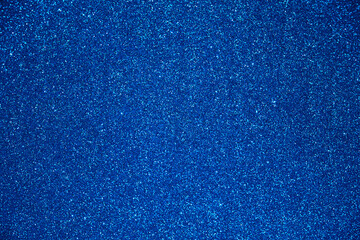 blue glitter texture christmas abstract background with bokeh