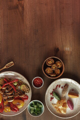dishes and snacks of traditional Caucasian Georgian cuisine. classic national serving on a rustic wooden table