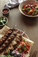 dishes and snacks of traditional Caucasian Georgian cuisine. classic national serving on a rustic wooden table