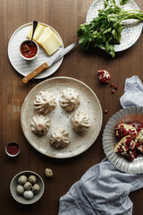 dishes and snacks of traditional Caucasian Georgian cuisine. classic national serving on a rustic wooden table