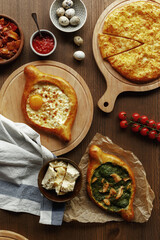 dishes and snacks of traditional Caucasian Georgian cuisine. classic national serving on a rustic wooden table