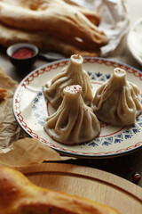 dishes and snacks of traditional Caucasian Georgian cuisine. classic national serving on a rustic wooden table