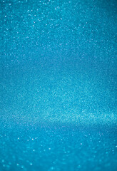 Obraz premium blue glitter texture christmas abstract background with bokeh