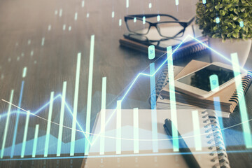 Double exposure of forex chart drawing and cell phone background. Concept of financial trading