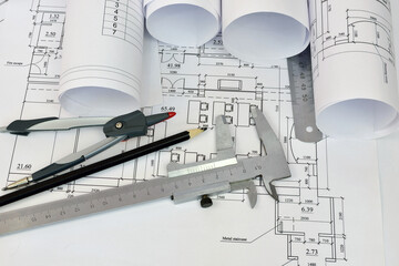 Scrolls drawings and tools of the architect