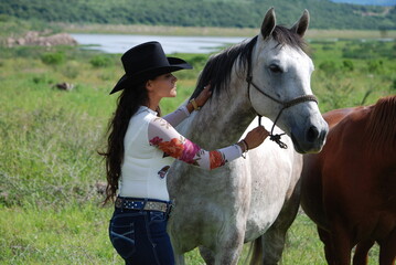 Obraz premium woman with horse