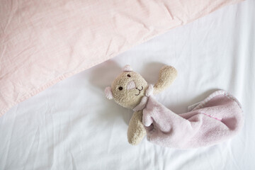 teddy in a bed