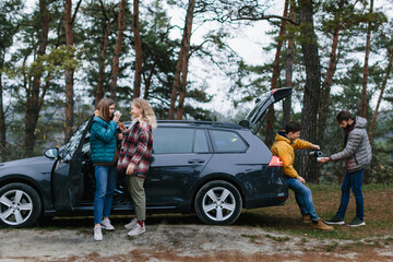 happy friends in the road trip