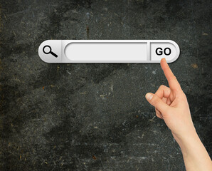 Human hand indicates the search bar in browser - Powered by Adobe