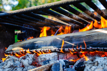 Grill with firewood, smoke and hot coal