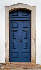 Ancient colonial door in historical city of Ouro Preto, Brazil  