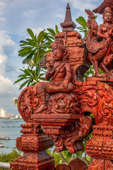 Fototapeta premium Pattaya City, Bang Lamung District/ Thailand- November 23, 2013: Wooden artworks at the viewing point in Pattaya